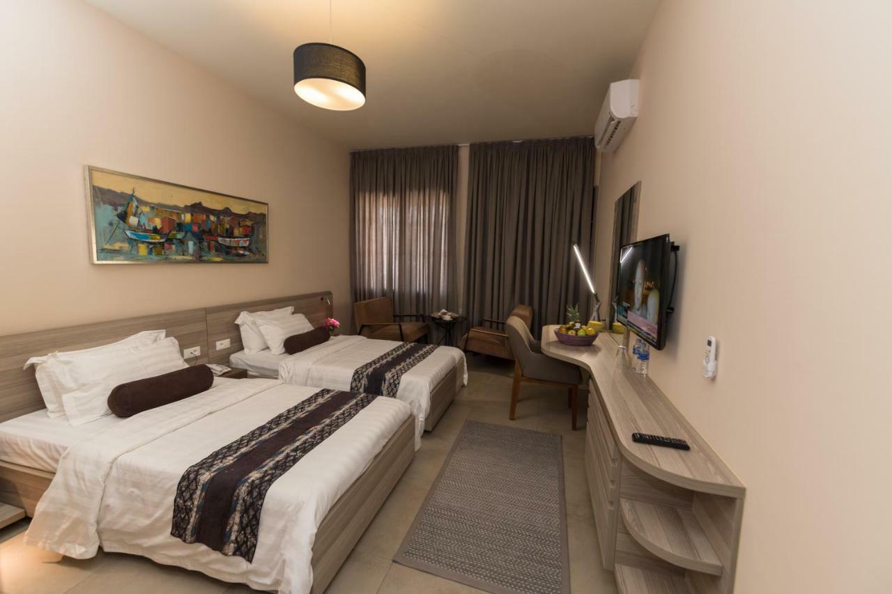 Roots Hotel Apartments 아비장 외부 사진